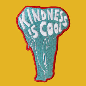 Elephant shaped embroidered kids badge/patch with the words/sloagn 'kindness is cool' irons on and then sew into place. 